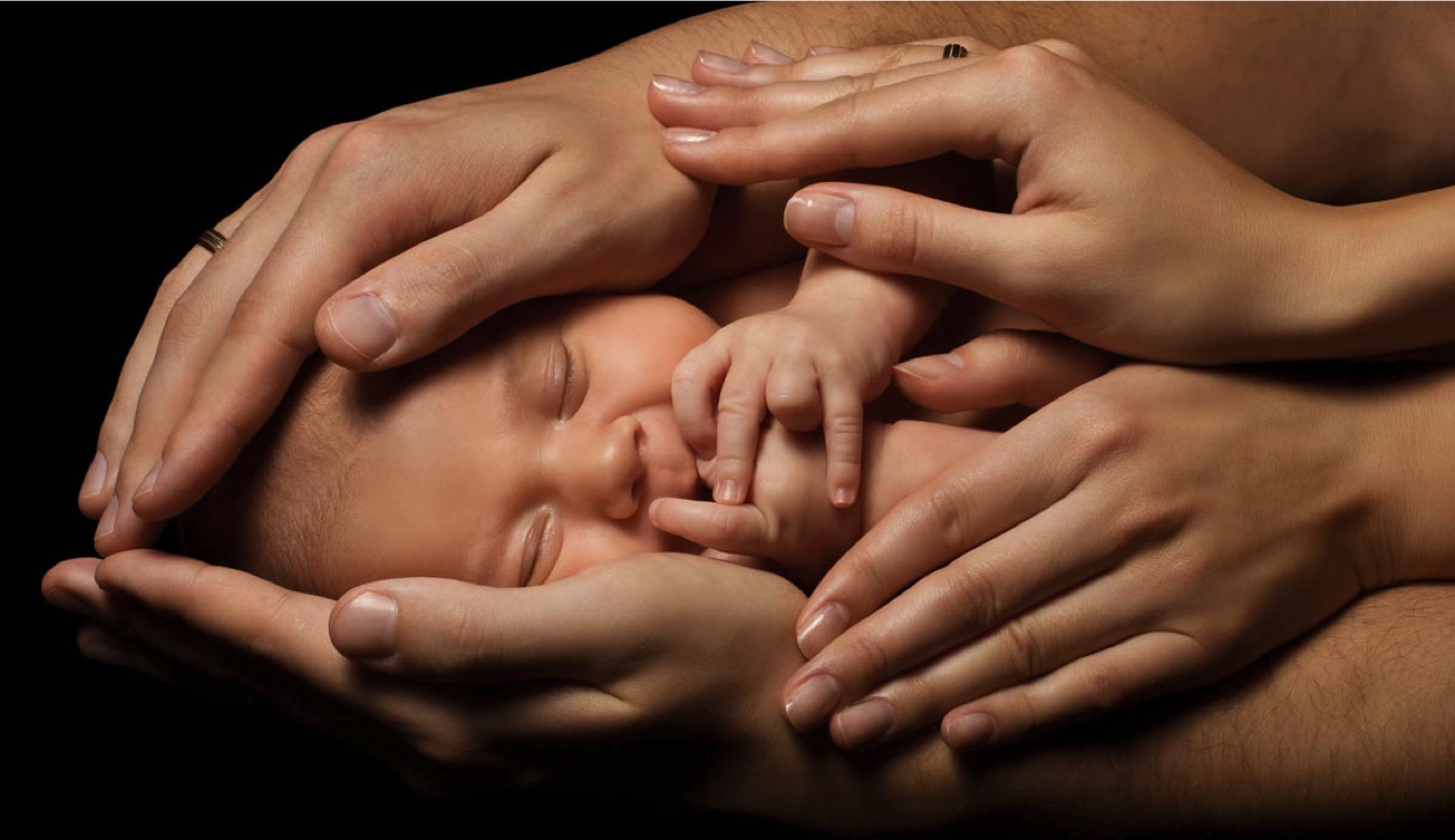 Baby being held - Healing Birth Trauma