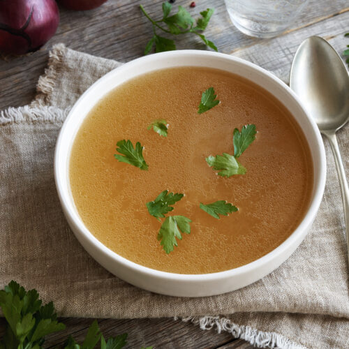 caldo bone broth by Pānquetzani or soup with herbs and vegetables - fourth trimester podcast