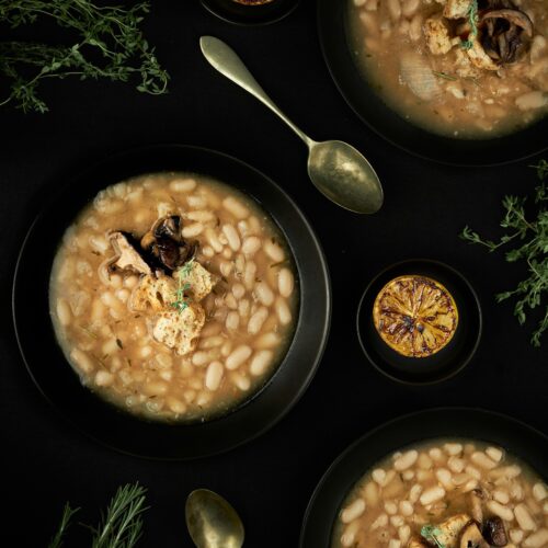 Freezer friendly postpartum soup with white beans, herbs, and broth
