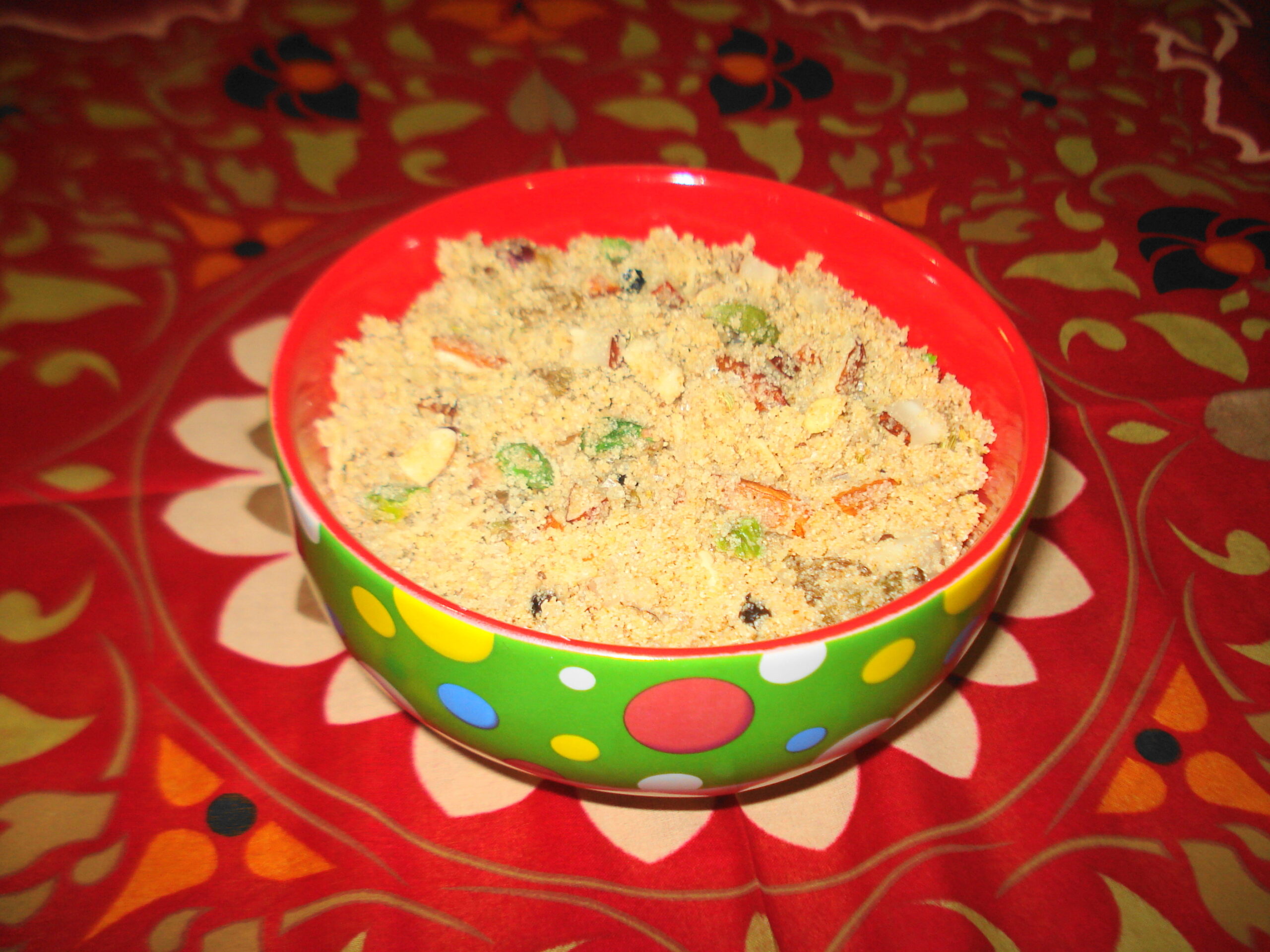 Postpartum panjiri recipe served in a bowl with nuts and ghee-roasted ingredients